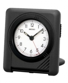 This sleekly styled alarm clock from Seiko is perfect for traveling anywhere. Square black plastic folding case. Rotating bezel sets alarm. Round white dial with logo, numeral indices, alarm with snooze and luminous hands. Folds into a carrying case. Seven-year battery included. Measures approximately 2-3/4 x 2-5/8 x 1/2. One-year limited warranty. This sleekly styled alarm clock from Seiko is perfect for traveling anywhere. Square black plastic folding case. Rotating bezel sets alarm. Round white dial with logo, numeral indices, alarm with snooze and luminous hands. Folds into a carrying case. Seven-year battery included. Measures approximately 2-3/4 x 2-5/8 x 1/2. One-year limited warranty.