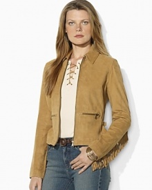 Western inspiration comes to life in a supple suede jacket, accented with a cascade of fringe along the arms and back.