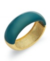 Charter Club's slip-on bangle bracelet flaunts the eye-catching combo of gold and teal, for a stylish effect. Crafted in gold tone mixed metal. Approximate diameter: 2-1/4 inches.
