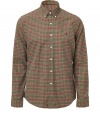 Easy, understated and classically cool, Polo Ralph Laurens plaid button-down is a must in any modern wardrobe - Small button-down collar, long sleeves, buttoned cuffs, front button placket, embroidered polo logo, shirttail hemline, allover print, new slim cut is more fitted through chest and torso - Dress up with suit trousers and a blazer, or go for a more casual look with jeans and a pullover