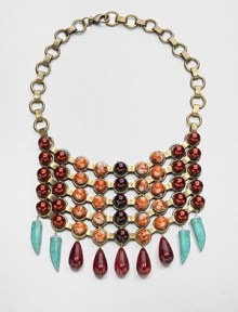 Colorful resin bead accent this statement piece for a truly bohemian look. BrassResin beadsLength, about 19Lobster clasp closureMade in USA Colorful resin bead accent this statement piece for a truly bohemian look. BrassResin beadsLength, about 19Lobster clasp closureMade in USA