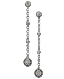 Dazzling drop earrings turn up the volume on any look. Set in sterling silver, this glam style features four stations accented by round-cut diamonds (1/4 ct. t.w.). Approximate drop: 1 inch. Dazzling drop earrings turn up the volume on any look. Set in sterling silver, this glam style features four stations accented by round-cut diamonds (1/4 ct. t.w.). Approximate drop: 1 inch.