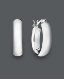 Silver sophistication combines with traditional elegance. This perfect pair of hoops features a smooth, flat, design. Crafted in sterling silver. Approximate diameter: 5/8 inch. Silver sophistication combines with traditional elegance. This perfect pair of hoops features a smooth, flat, design. Crafted in sterling silver. Approximate diameter: 5/8 inch.