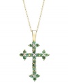 Boldly express your faith. This intricate cross pendant displays round-cut emeralds (1-1/6 ct. t.w.) and sparkling diamond accents set in 14k gold. Approximate length: 18 inches. Approximate drop: 1-1/4 inches.