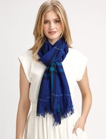A warm merino and cashmere blend with an iconic print and a crinkled texture. 55% fine merino/45% cashmereAbout 18 X 79Dry cleanImported A warm merino and cashmere blend with an iconic print and a crinkled texture. 55% fine merino/45% cashmereAbout 18 X 79Dry cleanImported