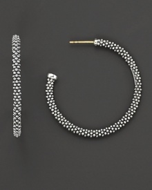 Signature sterling silver Caviar™ beaded earrings, designed by Lagos. Signature sterling silver Caviar™ beaded earrings, designed by Lagos.