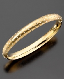 Tiny cross patterns etched into this beautiful diamond-cut bracelet give it a stately and regal air. Bangle bracelet crafted in 14k gold over sterling silver and sterling silver. Approximate diameter: 2-1/2 inches. Tiny cross patterns etched into this beautiful diamond-cut bracelet give it a stately and regal air. Bangle bracelet crafted in 14k gold over sterling silver and sterling silver. Approximate diameter: 2-1/2 inches.