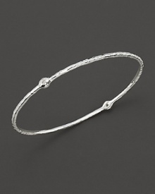 From the Silver collection, a two-diamond hammered bangle in sterling silver. Designed by Ippolita.