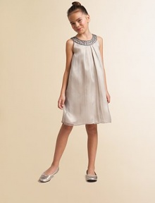 She'll be dressed to impress in this simply gorgeous, embellished chiffon frock.Beaded jewel necklineSleevelessBack zipperHem falls above kneeFully linedPolyester chiffonDry cleanImported She'll be dressed to impress in this simply gorgeous, embellished chiffon frock.Beaded jewel necklineSleevelessBack zipperHem falls above kneeFully linedPolyester chiffonDry cleanImported