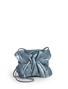 THE LOOKCrossbody strapCinched flapMagnetic tab closure under flapDrawstring topInside logo detailTHE MEASUREMENTCrossbody strap, 32 drop5W X 4H X 2½DTHE MATERIALPythonLeather and printed fabric liningORIGINMade in USA