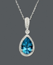 A single teardrop suspended from a delicate chain. Crafted in 14k white gold, this intricate pendant features a pear-cut blue topaz (3 ct. t.w.) and round-cut diamond (1/10 ct. t.w.). Approximate length: 18 inches. Approximate drop: 1 inch. A single teardrop suspended from a delicate chain. Crafted in 14k white gold, this intricate pendant features a pear-cut blue topaz (3 ct. t.w.) and round-cut diamond (1/10 ct. t.w.). Approximate length: 18 inches. Approximate drop: 1 inch.