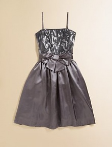 She'll shine like a disco ball in this glimmering frock with a frilly, full skirt gathered waist with bow.Square necklineSpaghetti strapsConcealed back zipperWaistband with bowFull skirtFully linedPolyester/nylonDry cleanMade in USA of imported fabric She'll shine like a disco ball in this glimmering frock with a frilly, full skirt gathered waist with bow.Square necklineSpaghetti strapsConcealed back zipperWaistband with bowFull skirtFully linedPolyester/nylonDry cleanMade in USA of imported fabric