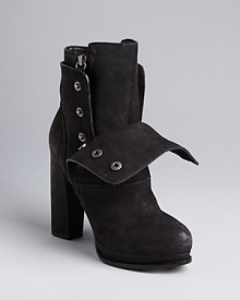Vera Wang Lavender Label hits all the right style points in these high heel booties. Snap them up for a polished look, or fold the cuffs and let the zippers show for moto edge. Vera Wang Lavender Label hits all the right style points in these high heel booties. Snap them up for a polished look, or fold the cuffs and let the zippers show for moto edge.