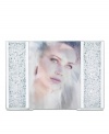 Make your memories shine even brighter with the Starlet picture frame. Thousands of tiny Swarovski crystals and polished metal trim put your photo on dazzling display.