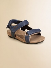 Sandals with double grip-tape closure and logo detail in plush leather.Double grip-tape strap with logo detailLeather upperRubber soleImported Sandals with double grip-tape closure and logo detail in plush leather.Double grip-tape strap with logo detailLeather upperRubber soleImported