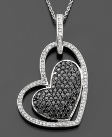 Love shines in every shade. This diamond heart necklace from Caviar by Effy Collection features black and white diamonds (7/8 ct. t.w.) set in 14k white gold. Approximate length: 18 inches. Approximate drop: 1-1/4 inches. Love shines in every shade. This diamond heart necklace from Caviar by Effy Collection features black and white diamonds (7/8 ct. t.w.) set in 14k white gold. Approximate length: 18 inches. Approximate drop: 1-1/4 inches.