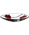 Inked with big red roses in eco-friendly paint, the handcrafted Tattoo dish features beautiful art glass with a cool rock n' roll edge. Designed by Ludvig Lofgren for Kosta Boda.