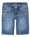 Get creative! Inspire her imaginative side with these fun, paint splatter bermuda shorts from Levi's.