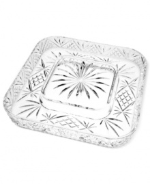 The sparkling sophistication of yesteryear makes a chic comeback with this elegant cheese and cracker platter, featuring the intricate starburst pattern of Godinger's popular Dublin crystal serveware collection. The sparkling sophistication of yesteryear makes a chic comeback with this elegant cheese and cracker platter, featuring the intricate starburst pattern of Godinger's popular Dublin crystal serveware collection.