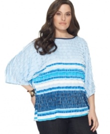 Tiered ruffles beautifully accent Elementz' dolman sleeve plus size top, featuring an on-trend striped pattern. Tiered ruffles beautifully accent Elementz' dolman sleeve plus size top, featuring an on-trend striped pattern.