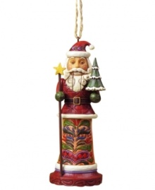 Jim Shore cracks the code on Christmas with an ornament that combines two holiday classics – St. Nick and a nutcracker! Featuring an ornately carved and patterned coat, star-topped staff and tiny tree. Jim Shore cracks the code on Christmas with an ornament that combines two holiday classics – St. Nick and a nutcracker! Featuring an ornately carved and patterned coat, star-topped staff and tiny tree.