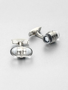 Signature cuff links, finished in platinum highlighted by a floating embossed emblem stars.PlatinumAbout 1 diam.Imported Signature cuff links, finished in platinum highlighted by a floating embossed emblem stars.PlatinumAbout 1 diam.Imported