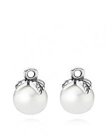 Lustrous freshwater pearls capped with sterling silver leaves add classic glamour to your PANDORA collection. These elegant charms suit both french wire and hoop earring styles.