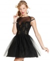 Glittery gold details and a lace bodice add glam while a tulle skirt brings charm to Ruby Rox's dazzling party dress!