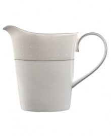 A graceful, classic shape makes this creamer the perfect complement to the Etoile covered sugar bowl. From innovative designer Monique Lhullier's collection of dinnerware and dishes, it features a pearlescent border with glossy raised dots and a fine stitch-like pattern. A graceful, classic shape makes this creamer the perfect complement to the Etoile covered sugar bowl. From innovative designer Monique Lhullier's collection of dinnerware and dishes, it features a pearlescent border with glossy raised dots and a fine stitch-like pattern.