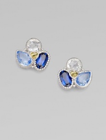 From the Prism Collection. A cluster of blue quartz and corundum and crystal richly framed in sterling silver.Blue quartz, blue corundum, and crystal Sterling silver Length, about ½ Post and butterfly backs Imported