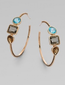 From the Trujillo Collection. A circle of blue topaz, a square of smoky topaz and a teardrop of cognac quartz sit side by side radiantly on a slender beaded hoop.Blue topaz, smoky topaz and cognac quartzBronzeDiameter, about 2¼Post backMade in USA From the Trujillo Collection. A circle of blue topaz, a square of smoky topaz and a teardrop of cognac quartz sit side by side radiantly on a slender beaded hoop.Blue topaz, smoky topaz and cognac quartzBronzeDiameter, about 2¼Post backMade in USA