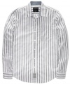 Streamline your look with this easy-wear striped shirt from Calvin Klein.