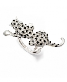 Your prowl for fierce fashion stops here. Kenneth Jay Lane's snow leopard crouches low, covered in spots of black stones and crystal accents. Ring crafted from mixed metal. Adjustable sizing; one size fits most. Approximate width of leopard: 2 inches.