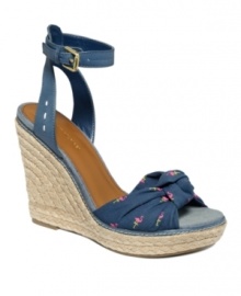 Sweet disposition. A pretty open-toe design and espadrille wedge lend girl-next-door appeal to the Veronica espadrille wedges by Tommy Hilfiger.