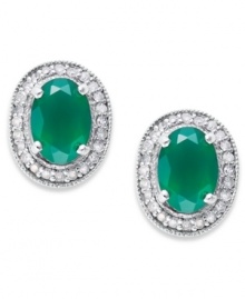Make a sparkling impact with pretty studs. Set in sterling silver, an oval-cut green agate (1-3/8 ct. t.w.) glows against a halo of round-cut diamonds (1/6 ct. t.w.). Approximate length: 10-2/5 inch. Approximate width: 8-2/5 inch. Make a sparkling impact with pretty studs. Set in sterling silver, an oval-cut green agate (1-3/8 ct. t.w.) glows against a halo of round-cut diamonds (1/6 ct. t.w.). Approximate length: 10-2/5 inch. Approximate width: 8-2/5 inch.