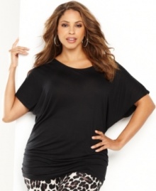 Dramatically full sleeves and a ruched hemlinecreate a captivating look for INC's essential plus size tunic.