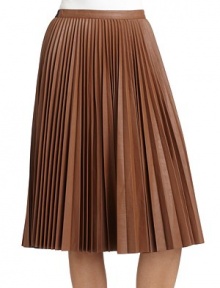 THE LOOKAllover accordion pleated faux leather constructionBanded waistA-line silhouetteTHE FITAbout 26 from waist to hemTHE MATERIALPolyurethane/rayonFully linedCARE & ORIGINDry cleanImportedModel shown is 5'10 (177cm) wearing US size Small. THE LOOKAllover accordion pleated faux leather constructionBanded waistA-line silhouetteTHE FITAbout 26 from waist to hemTHE MATERIALPolyurethane/rayonFully linedCARE & ORIGINDry cleanImportedModel shown is 5'10 (177cm) wearing US size Small.