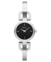 Polished perfection, by DKNY. This silver tone bangle watch features an intriguing black dial with minimalist details.