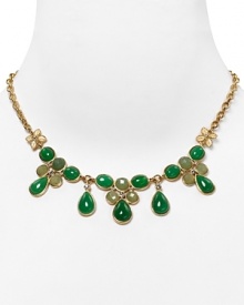 Clustered with jade, aventurine, and crystal stones, Carolee Lux's plated frontal necklace is a bold take on the floral motif. Clustered with jade, aventurine, and crystal stones, Carolee Lux's plated frontal necklace is a bold take on the floral motif.