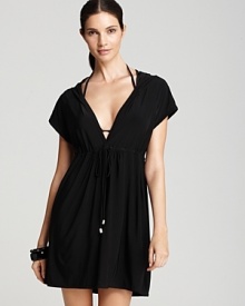 In a draped silhouette with a hood, Magicsuit's solid cover up will add instant attitude to your on-vacation look. This dress feels low-key chic with flat sandals and oversized frames.