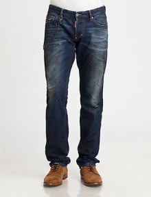 Whiskering and distressed details lend this denim style a cool, lived-in look.Belt loopsZip fly with button closureFive-pocket styleInseam, about 31CottonDry cleanMade in Italy of imported fabric Whiskering and distressed details lend this denim style a cool, lived-in look.Belt loopsZip fly with button closureFive-pocket styleInseam, about 31CottonDry cleanMade in Italy of imported fabric