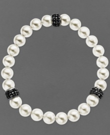 Slip a little elegance over your wrist. Kaleidoscope's pretty bracelet features a mix of cultured freshwater pearls (8 mm) and sparkling stations made from black crystals with Swarovski Elements. Bracelet stretches to fit wrist. Approximate length: 7-1/2 inches. Slip a little elegance over your wrist. Kaleidoscope's pretty bracelet features a mix of cultured freshwater pearls (8 mm) and sparkling stations made from black crystals with Swarovski Elements. Bracelet stretches to fit wrist. Approximate length: 7-1/2 inches.