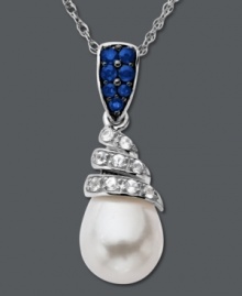 Swirling sophistication. Set in sterling silver, this unique pendant features round-cut blue sapphires at the bail (1/5 ct. t.w.) with round-cut white sapphires (1/5 ct. t.w.) encircling a cultured freshwater pearl (9 mm x 11 mm). Approximate length: 18 inches. Approximate drop: 1 inch. Swirling sophistication. Set in sterling silver, this unique pendant features round-cut blue sapphires at the bail (1/5 ct. t.w.) with round-cut white sapphires (1/5 ct. t.w.) encircling a cultured freshwater pearl (9 mm x 11 mm). Approximate length: 18 inches. Approximate drop: 1 inch.