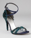 Evoking a dream-like aviary and bird-themed ballets, these feathered Le Plumes sandals from Stuart Weitzman put a unique spin on evening attire.