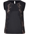 Luxurious top in fine black silk with transparent lace for a sexy look - Fully lined in nude for a peek-a-boo appearance - Round neckline, short sleeves and a narrow, tailored cut - Try with cropped pants, pencil skirts and slim pants - Pair for a night out with skinny jeans, heels, moto-style leather jacket and long strands of pearls