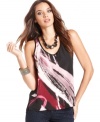 A bold abstract print adds a splash of color to this GUESS tank -- perfectly paired with the season's skinny jeans!