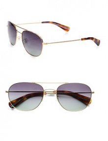 Masculine, double-bridge design with rounded vintage lens shape and tangled stripe temple detail. Available in brushed gold with green gradient lens.Logo temple detail100% UV ProtectionImported Masculine, double-bridge design with rounded vintage lens shape and tangled stripe temple detail. Available in brushed gold with green gradient lens.Logo temple detail100% UV ProtectionImported