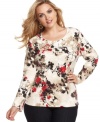 Blossoms bloom all winter long with Karen Scott's plus size printed top! Dress it up with an A-line skirt or go casual by pairing it with your favorite jeans.