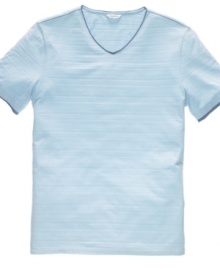 Nothing beats a classic. This v-neck t-shirt from Calvin Klein is a simple casual style solution. Nothing beats a classic. This v-neck t-shirt from Calvin Klein is a simple casual style solution.