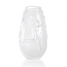 A twirling dance of goodness and nymphs, bearing dew drop crowns, adorn this small vase. A twirling dance of goodness and nymphs, bearing dew drop crowns, adorn this small vase.